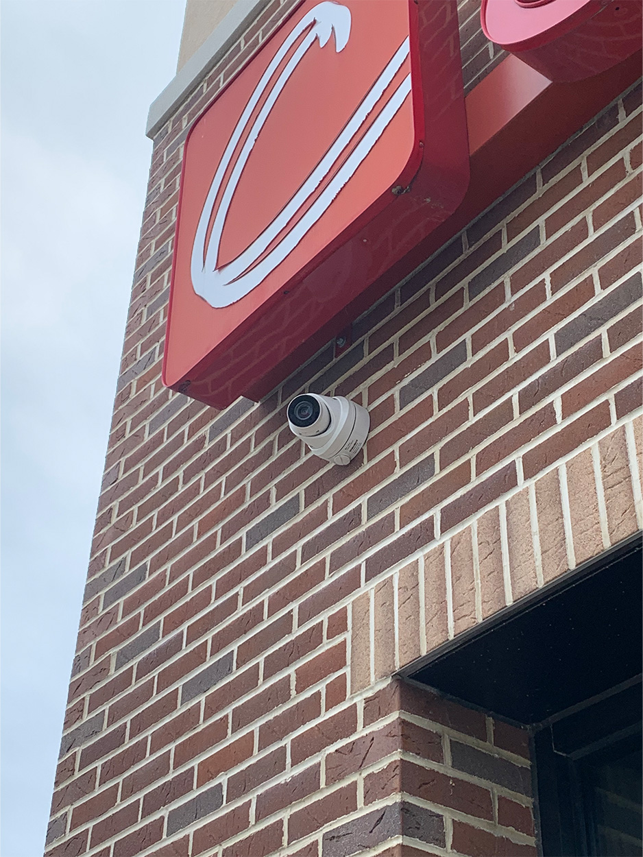 Video Surveillance - Camera on brick building